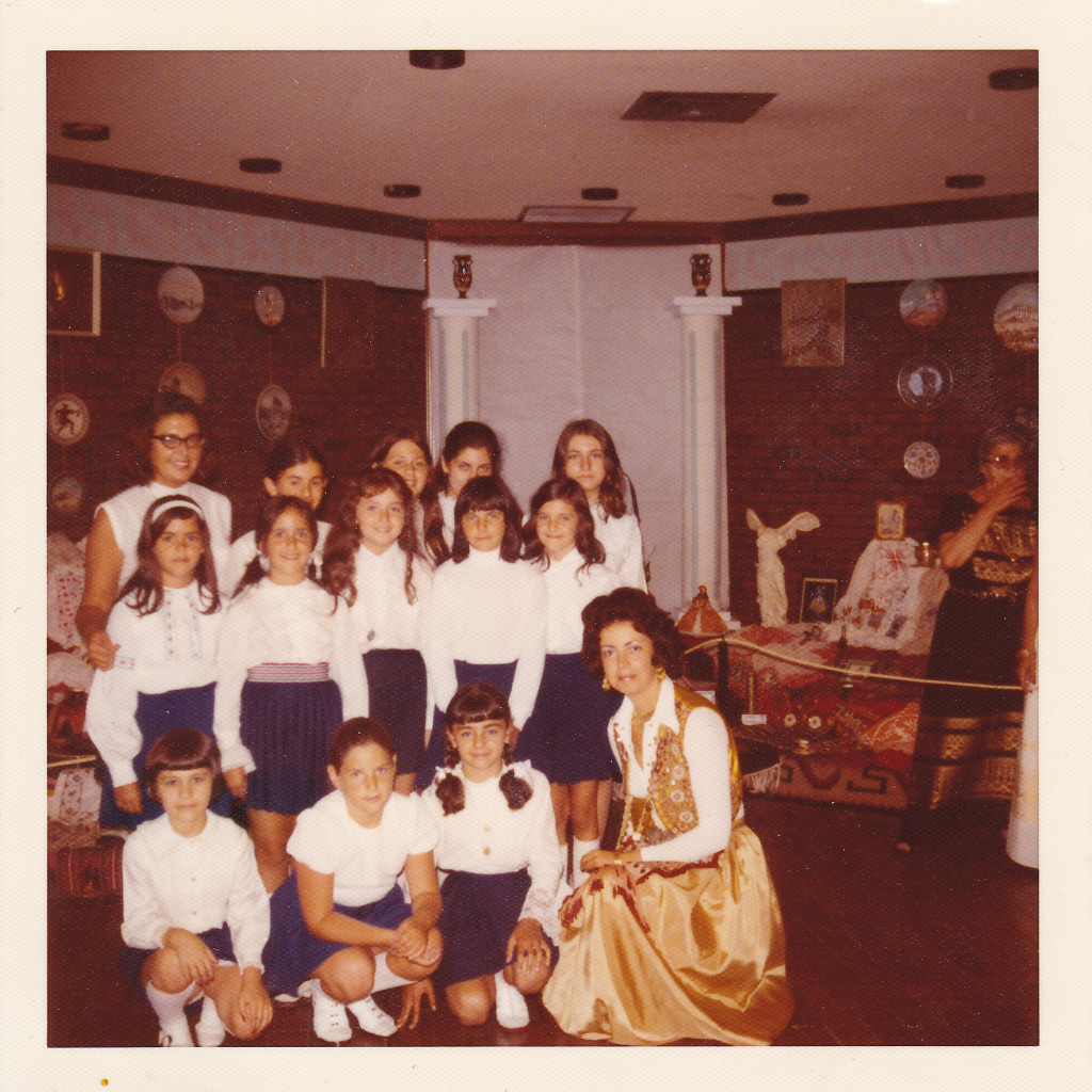 Maria Triada Karkoulis with a group of students at Folklore in the 1970s.