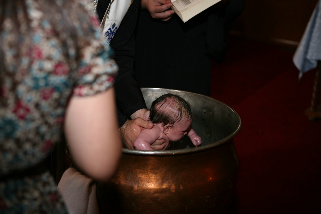 Fr. C. baptizing his daughter, Joanna, at Koimisis Tis Theotokou.