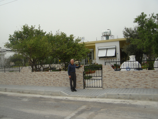 A recent photo of Andreas visiting his family home in Boghazi.